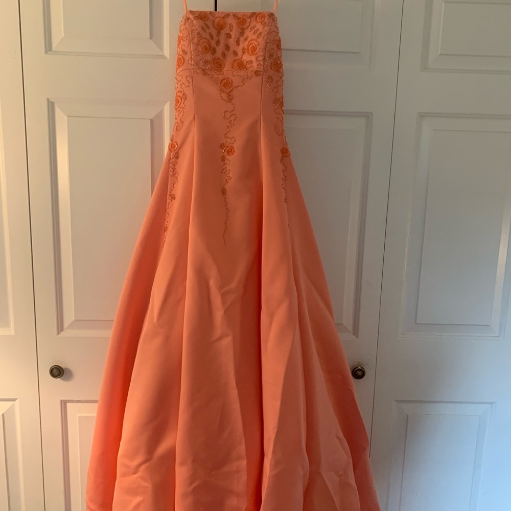 Tangerine Cache strapless size 6 prom dress.